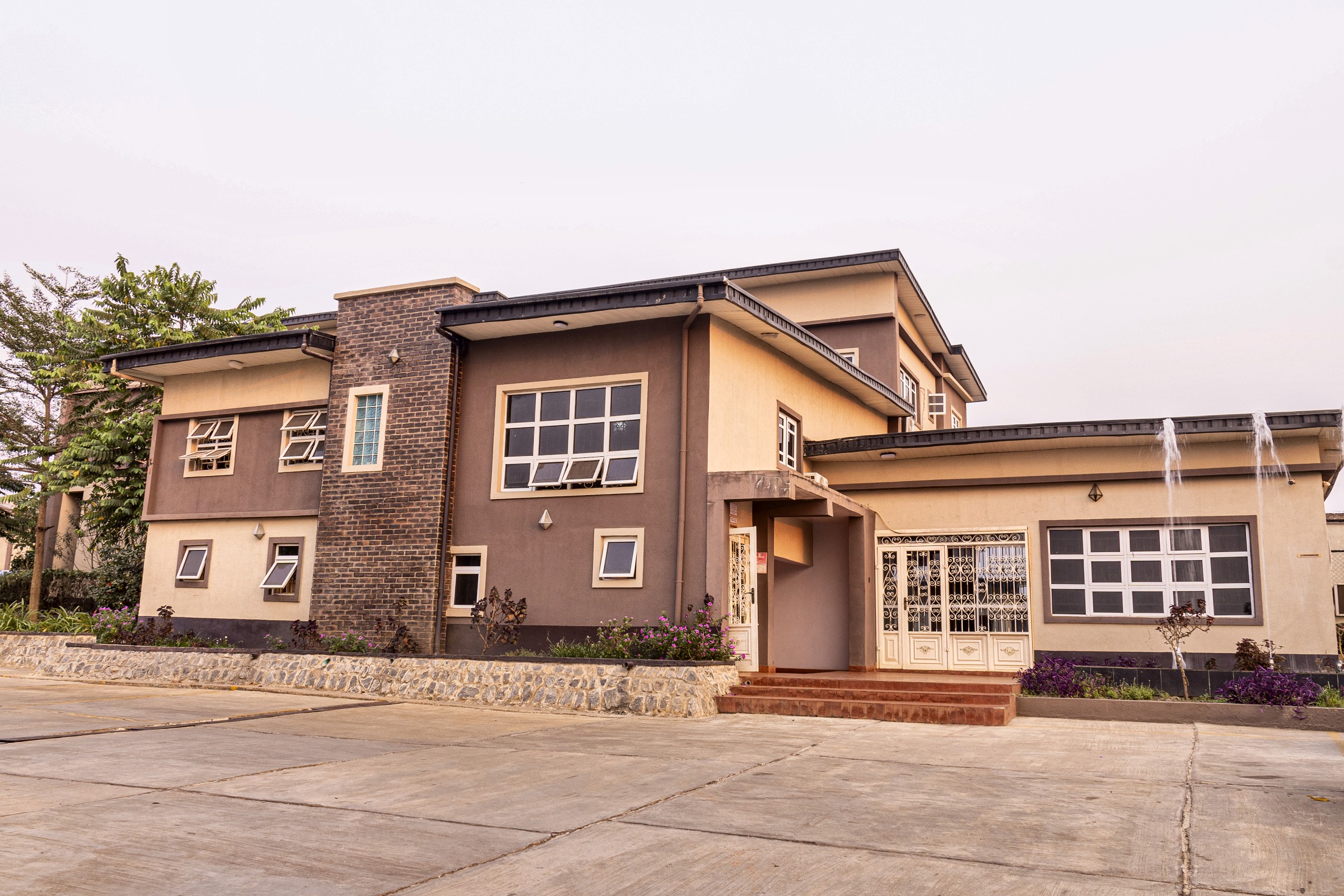 Aryhills Hotel hilltop exterior at dusk